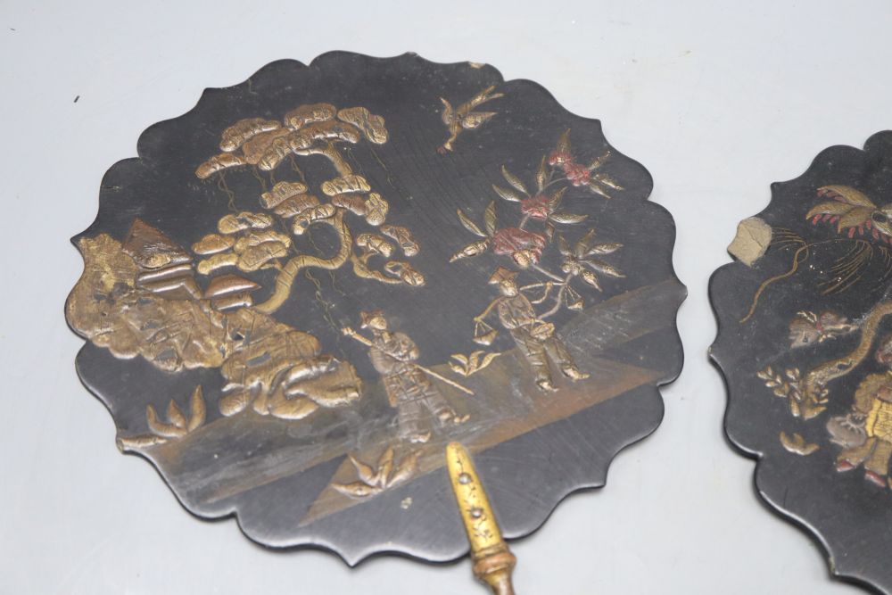 A pair of Japanese lacquered face screens, length 42cm